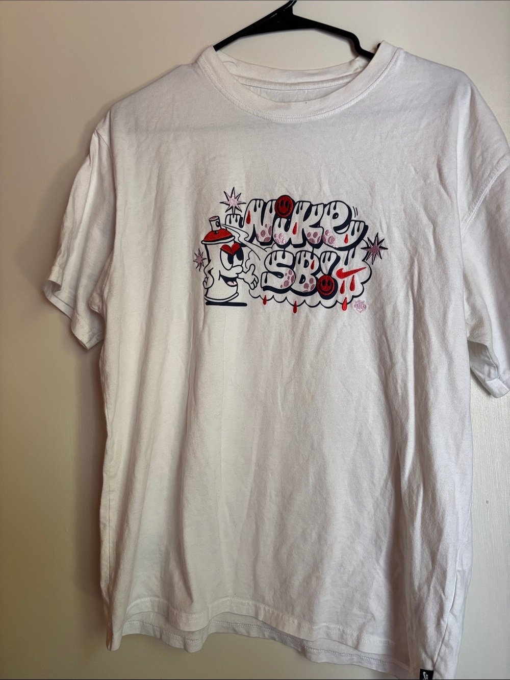 Nike White Short Sleeve Tee with Red & Black Graffiti Graphic